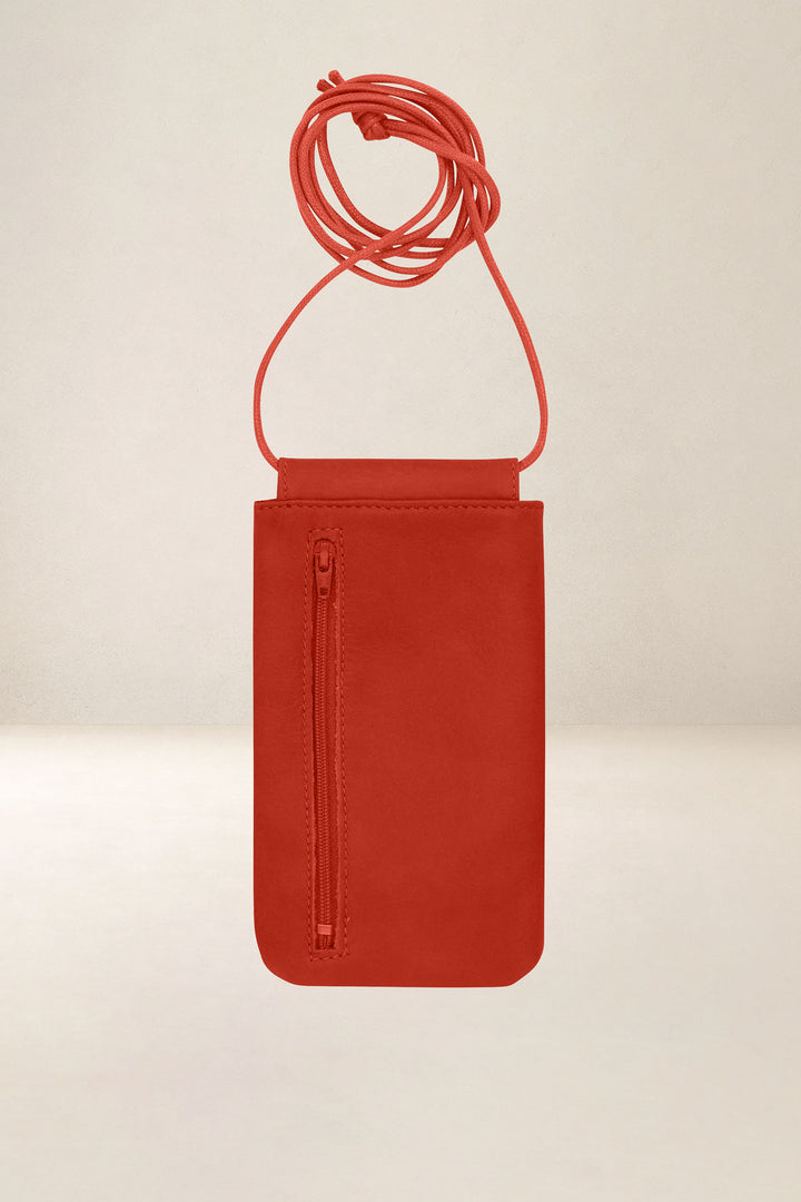 Porte-téléphone en cuir pleine fleur CIRCÉ coloris orange confit, vue de dos – Ateliers Fourès