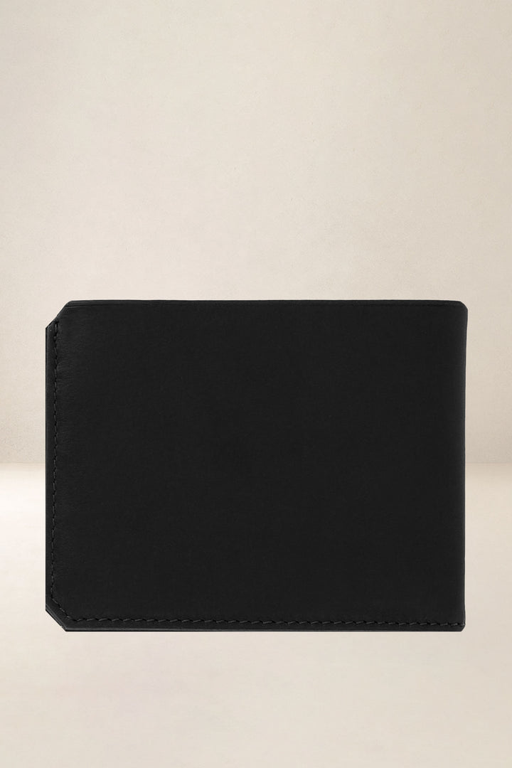 Portefeuille medium en cuir pleine fleur ULYSSE coloris noir, vue de dos – Ateliers Fourès