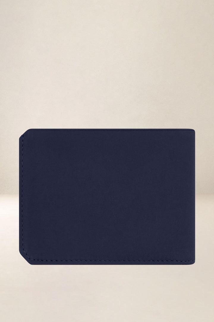 Portefeuille medium en cuir pleine fleur ULYSSE coloris marine, vue de dos – Ateliers Fourès