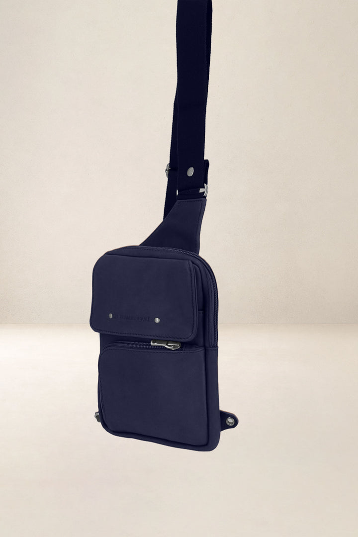 Holster en cuir pleine fleur PALLAS coloris marine, vue de profil – Ateliers Fourès