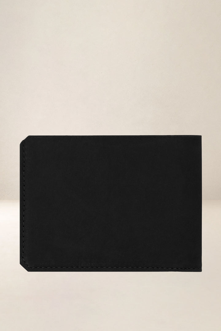 Portefeuille medium en cuir pleine fleur ULYSSE coloris noir, vue de dos – Ateliers Fourès