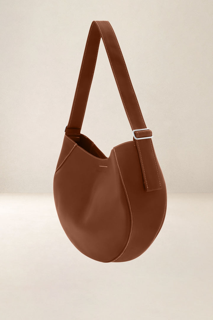 Sac à main en cuir pleine fleur ETNA coloris fauve, vue de profil n°1 – Ateliers Fourès