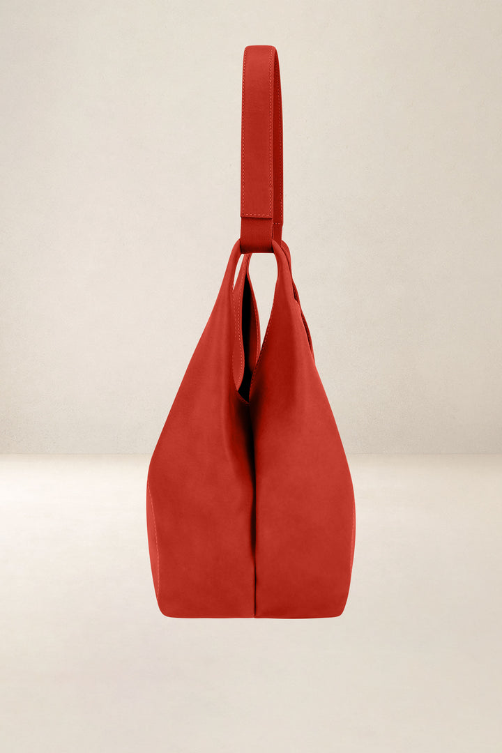 Sac à main en cuir pleine fleur AMAZONE coloris orange confit, vue de profil n°2 – Ateliers Fourès