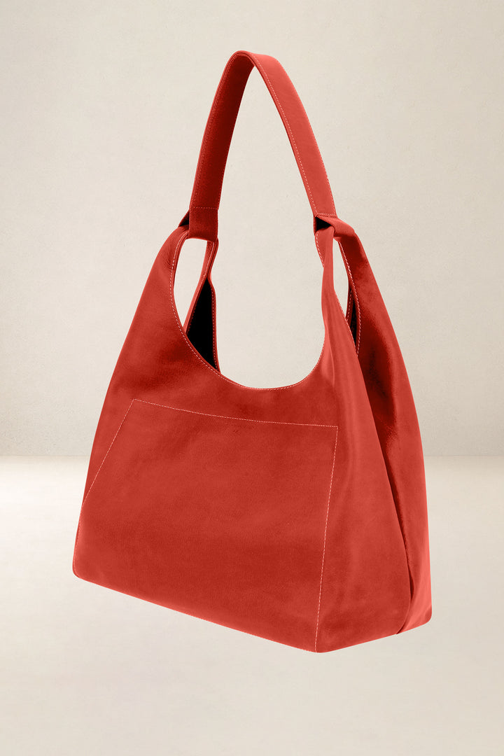 Sac de voyage en cuir pleine fleur AMAZONE coloris orange confit, vue de profil n°1 – Ateliers Fourès