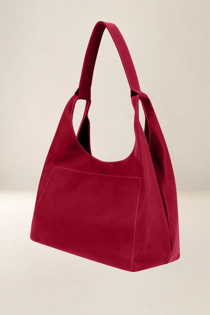 Sac de voyage en cuir pleine fleur AMAZONE coloris amour, vue de profil n°1 – Ateliers Fourès