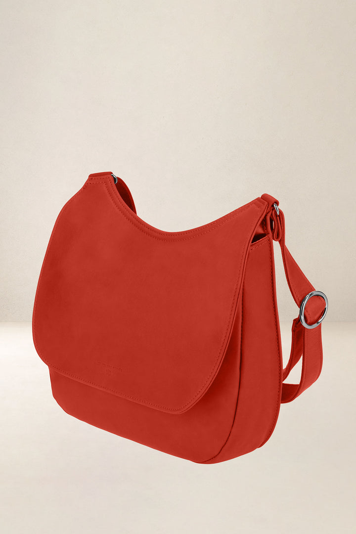 Sac à main en cuir pleine fleur ARTÉMIS coloris orange confit, vue de profil – Ateliers Fourès