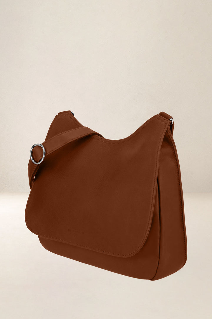 Sac à main en cuir pleine fleur ARTÉMIS coloris fauve, vue de profil – Ateliers Fourès
