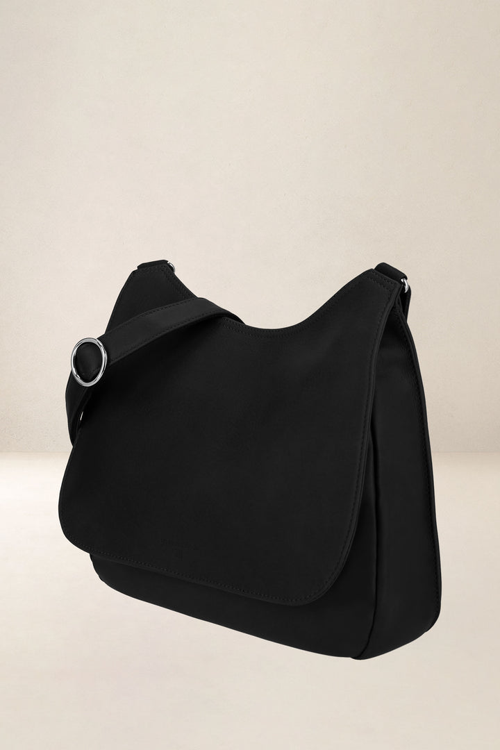 Sac à main en cuir pleine fleur ARTÉMIS coloris noir, vue de profil – Ateliers Fourès