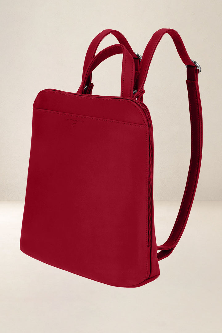 Sac à dos en cuir pleine fleur ANDROMÈDE coloris amour, vue de profil n°1 – Ateliers Fourès