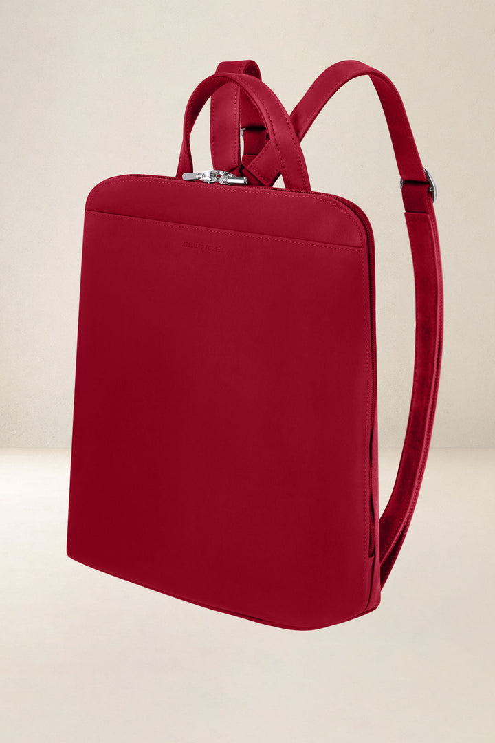 Sac à dos en cuir pleine fleur ANDROMÈDE coloris amour, vue de profil n°1 – Ateliers Fourès