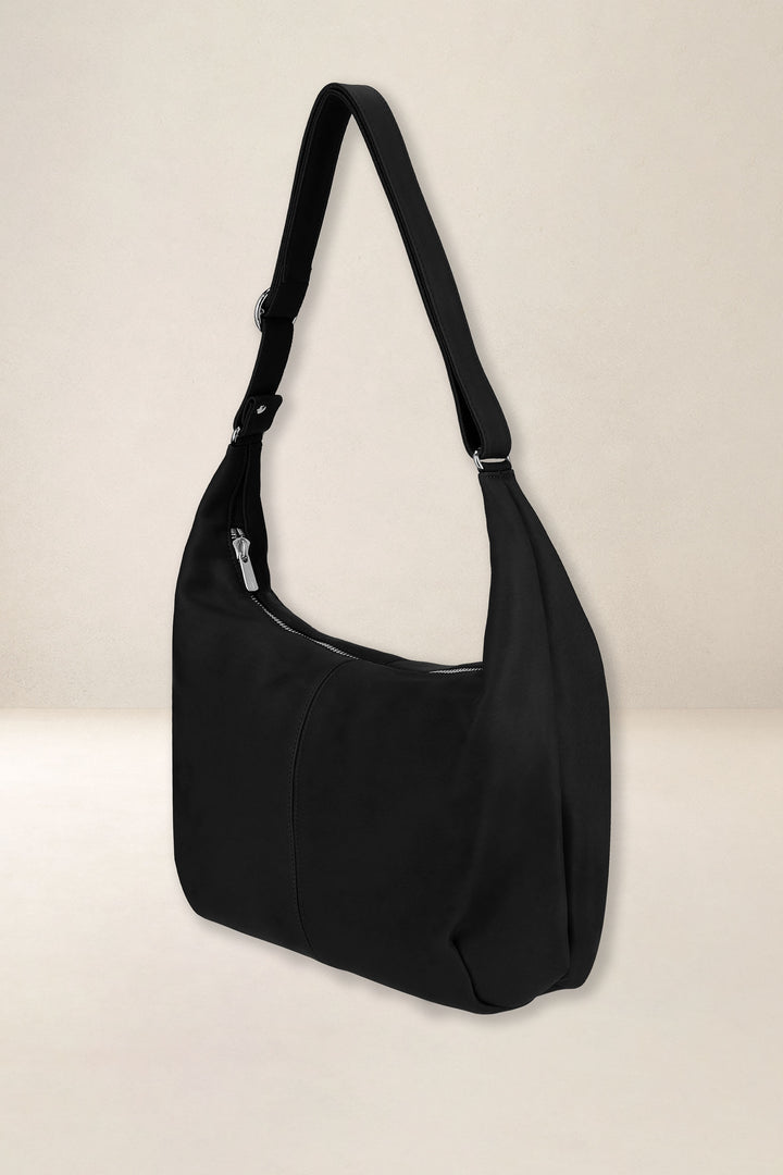 Sac à main en cuir pleine fleur LÉTO coloris noir, vue de profil n°1 – Ateliers Fourès