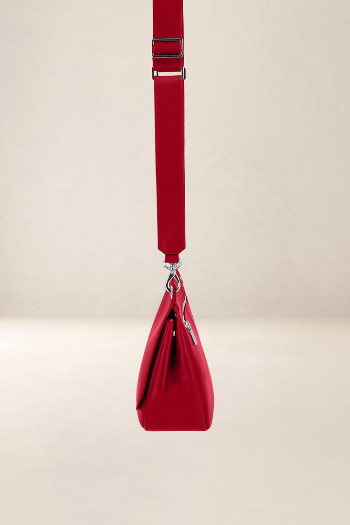 Mini sac en cuir pleine fleur APHRODITE coloris carmen, vue de profil n°2 – Ateliers Fourès