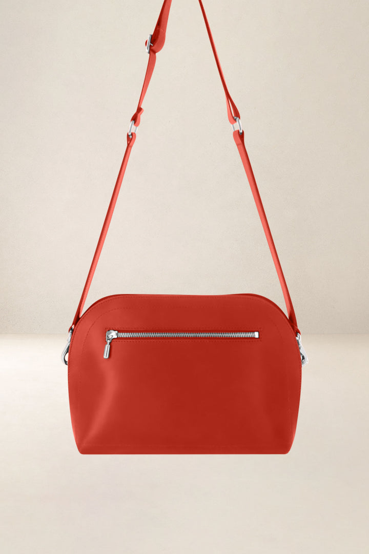 Sac bandoulière en cuir pleine fleur ODYSSÉE coloris orange, vue de dos – Ateliers Fourès