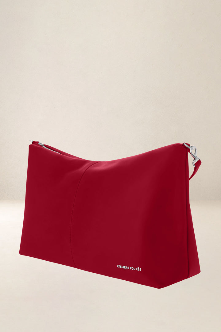 Sac de voyage en cuir pleine fleur ILIADE coloris amour, vue de profil n°1 – Ateliers Fourès